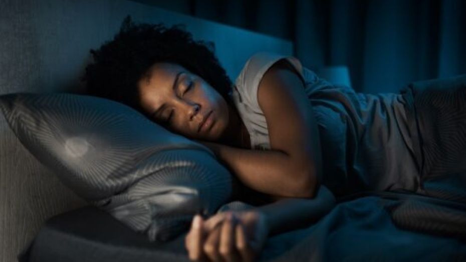 Black-woman-sleeping-in-her-bed-1-19513a3bc6